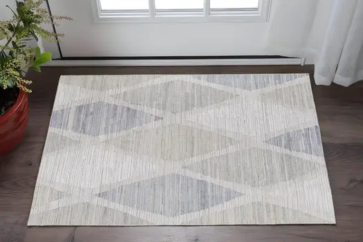 2' X 3' Ivory and Blue Geometric Hand Woven Area Rug