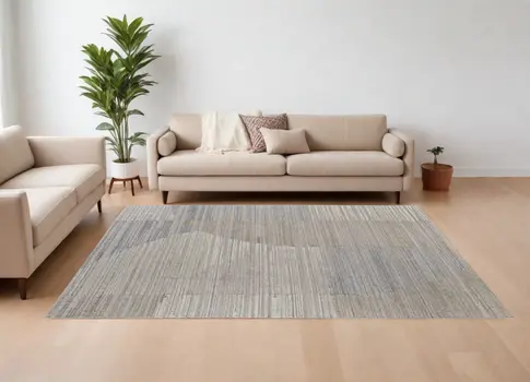 8' X 10' Tan and Blue Abstract Hand Woven Worn Faded Area Rug