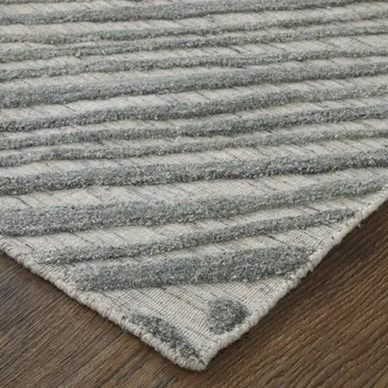 5' X 8' Green and Ivory Abstract Hand Woven Area Rug