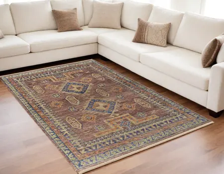 5' X 8' Blue Red and Tan Wool Geometric Hand Knotted Area Rug With Fringe