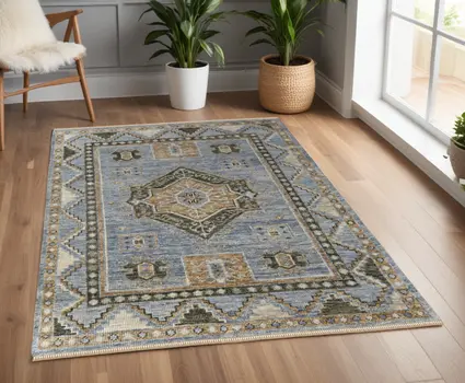 4' X 6' Ivory Tan and Blue Wool Oriental Hand Knotted Area Rug With Fringe