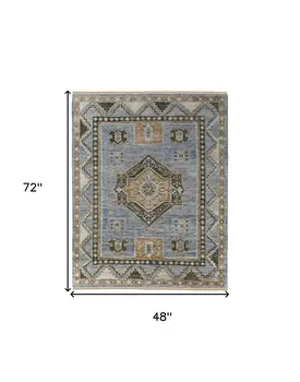 4' X 6' Ivory Tan and Blue Wool Oriental Hand Knotted Area Rug With Fringe