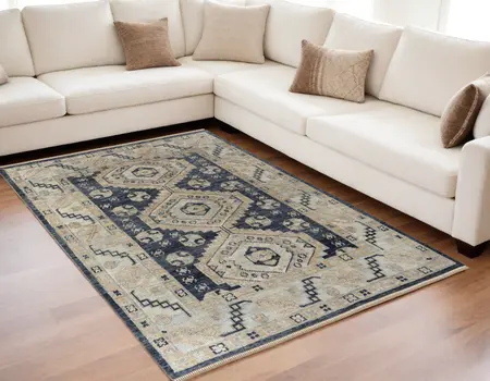 5' X 8' Blue and Ivory Wool Geometric Hand Knotted Area Rug With Fringe
