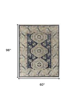 5' X 8' Blue and Ivory Wool Geometric Hand Knotted Area Rug With Fringe