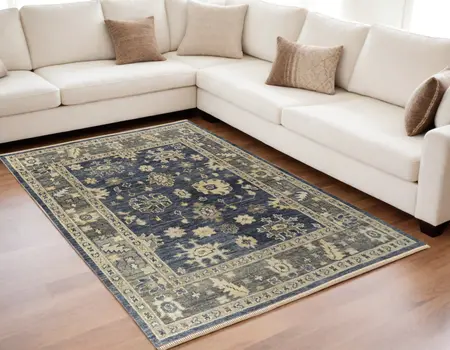 5' X 8' Blue and Gray Wool Floral Hand Knotted Area Rug With Fringe