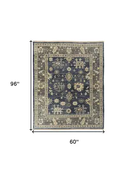 5' X 8' Blue and Gray Wool Floral Hand Knotted Area Rug With Fringe