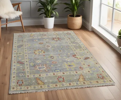 4' X 6' Light Blue and Taupe Wool Floral Hand Knotted Area Rug With Fringe