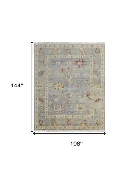 9' X 12' Light Blue and Taupe Wool Floral Hand Knotted Area Rug With Fringe