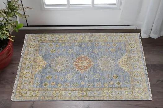 2' X 3' Green Blue and Yellow Wool Geometric Hand Knotted Area Rug With Fringe