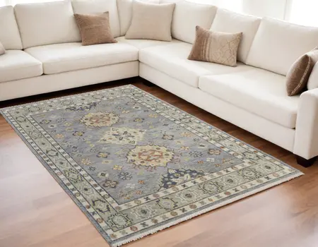5' X 8' Gray Blue and Taupe Wool Geometric Hand Knotted Area Rug With Fringe