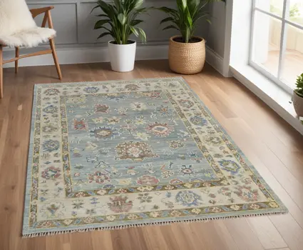 4' X 6' Blue Ivory and Yellow Wool Floral Hand Knotted Area Rug With Fringe