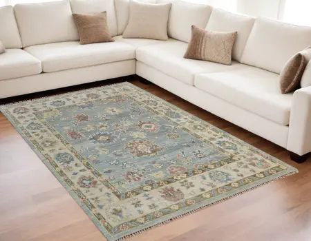5' X 8' Blue Ivory and Yellow Wool Floral Hand Knotted Area Rug With Fringe