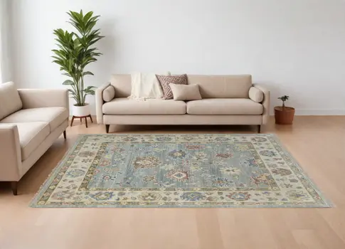 8' X 10' Blue Ivory and Yellow Wool Floral Hand Knotted Area Rug With Fringe