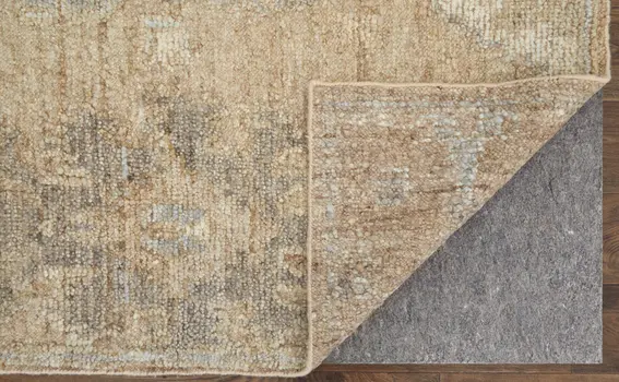 6' X 9' Tan and Ivory Wool Floral Hand Knotted Area Rug