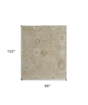 6' X 9' Tan and Ivory Wool Floral Hand Knotted Area Rug