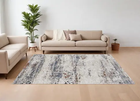 8' X 10' Gray Blue and Ivory Abstract Power Loom Area Rug