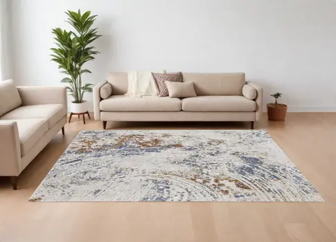 8' X 10' Ivory Blue and Brown Abstract Power Loom Area Rug