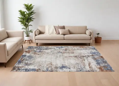 10' X 14' Blue Gray and Brown Abstract Power Loom Worn Faded Area Rug
