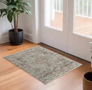 3' X 5' Red Tan and Blue Oriental Power Loom Worn Faded Area Rug With Fringe