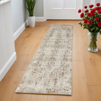 8' Ivory Gray and Brown Abstract Power Loom Worn Faded Runner Rug With Fringe