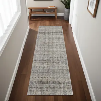8' Gray Ivory and Blue Abstract Power Loom Worn Faded Runner Rug With Fringe