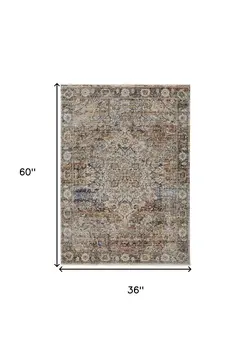 3' X 5' Tan Blue and Brown Oriental Power Loom Area Rug With Fringe