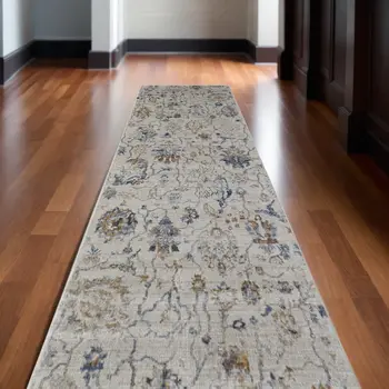 12' Blue Gray and Brown Floral Power Loom Worn Faded Runner Rug With Fringe
