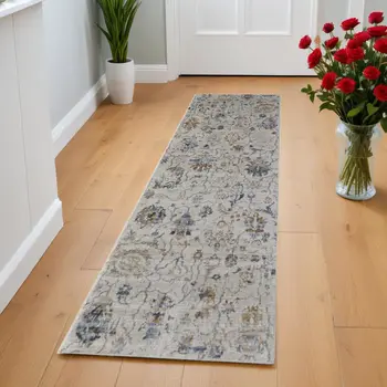 8' Blue Gray and Brown Floral Power Loom Worn Faded Runner Rug With Fringe