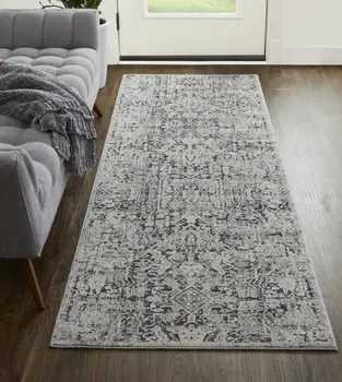 8' Ivory and Gray Abstract Power Loom Worn Faded Runner Rug With Fringe