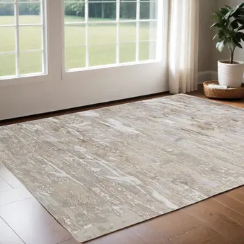3' X 5' Ivory Gray and Tan Abstract Power Loom Worn Faded Area Rug