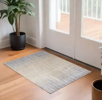 3' X 5' Ivory Tan and Blue Ombre Power Loom Worn Faded Area Rug