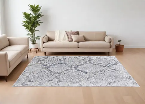 8' X 10' Gray Silver and Blue Floral Power Loom Area Rug