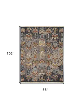 6' X 9' Blue Gray and Brown Wool Ikat Hand Knotted Area Rug With Fringe