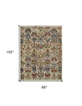 6' X 9' Ivory Blue and Brown Wool Ikat Hand Knotted Area Rug With Fringe