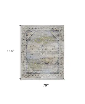 7' X 10' Ivory Green and Blue Abstract Power Loom Worn Faded Area Rug