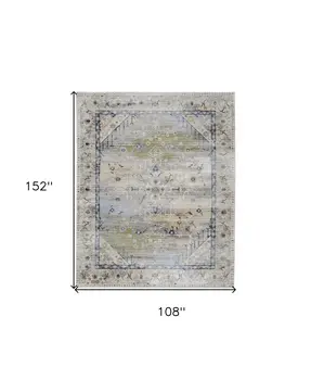 9' X 13' Ivory Green and Blue Abstract Power Loom Worn Faded Area Rug