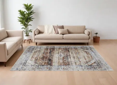 9' X 13' Ivory Red and Blue Abstract Power Loom Worn Faded Area Rug