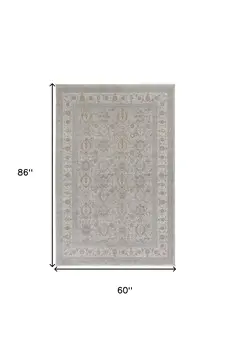 5' X 7' Silver Taupe and Blue Oriental Power Loom Worn Faded Area Rug With Fringe