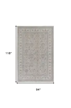 8' X 10' Silver Taupe and Blue Oriental Power Loom Worn Faded Area Rug With Fringe