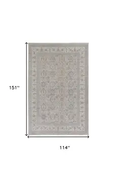 9' X 13' Silver Taupe and Blue Oriental Power Loom Worn Faded Area Rug With Fringe