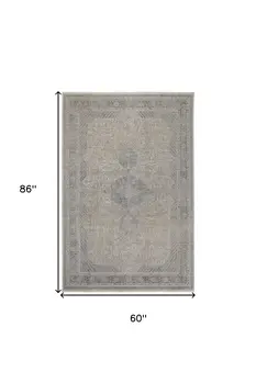 5' X 7' Gray Blue and Taupe Oriental Power Loom Worn Faded Area Rug With Fringe
