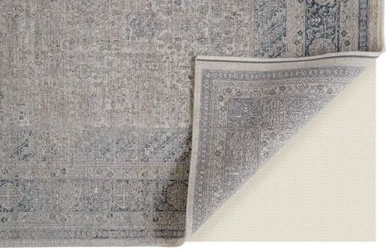 2' X 3' Gray Blue and Taupe Oriental Power Loom Worn Faded Area Rug With Fringe