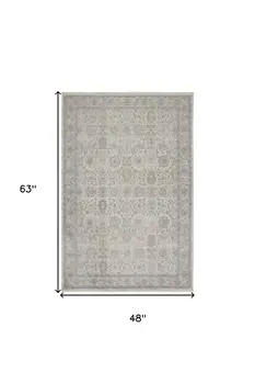 4' X 5' Gray and Ivory Oriental Power Loom Worn Faded Area Rug With Fringe