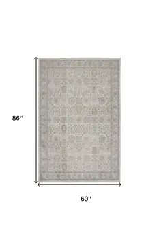 5' X 7' Gray and Ivory Oriental Power Loom Worn Faded Area Rug With Fringe