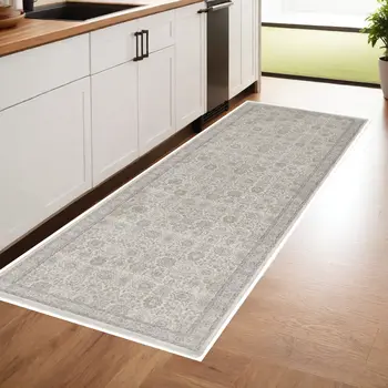 8' Gray and Ivory Oriental Power Loom Worn Faded Runner Rug With Fringe