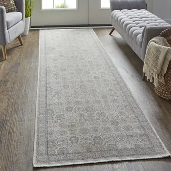 12' Gray and Ivory Oriental Power Loom Worn Faded Runner Rug With Fringe