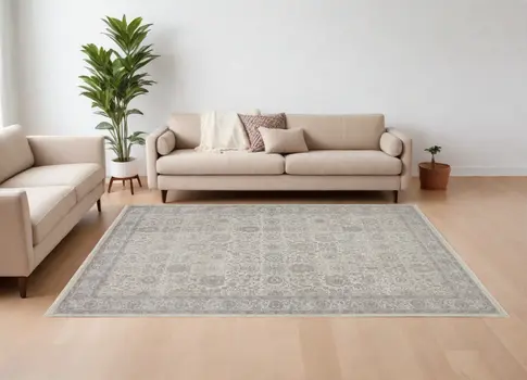 12' X 15' Gray and Ivory Oriental Power Loom Worn Faded Area Rug With Fringe