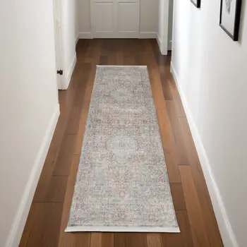 8' Gray Ivory and Orange Oriental Power Loom Worn Faded Runner Rug With Fringe