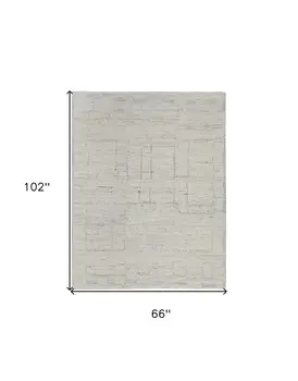 6' X 9' Gray and Ivory Abstract Hand Woven Worn Faded Area Rug