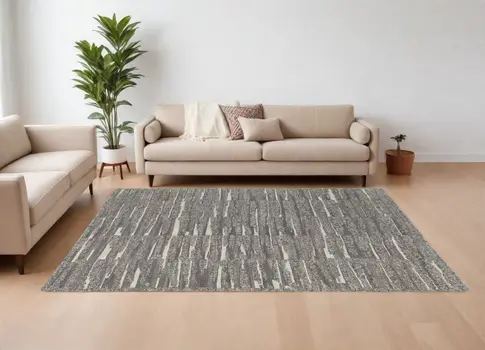 8' X 12' Gray Ivory and Taupe Abstract Hand Woven Area Rug